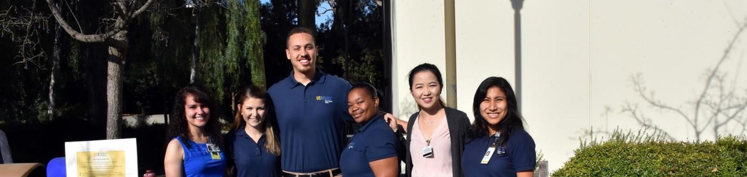 group presenting at open house